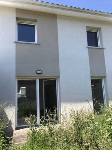 Maison traversante de type T4 avec garage et jardin