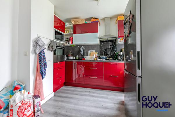 Appartement 3 pièces de 56 m² , terrasse, box et place de parking à vendre à LIEUSAINT (77127).