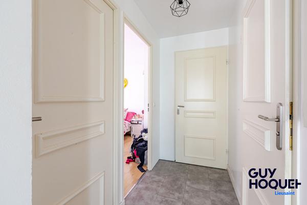 Appartement 3 pièces de 56 m² , terrasse, box et place de parking à vendre à LIEUSAINT (77127).