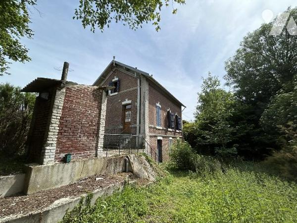 ancienne maison éclusière à rénover avec jardin et garage