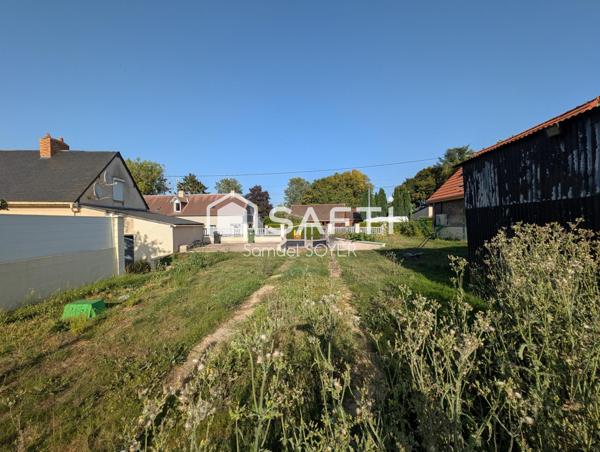 GRANDE MAISON INDIVIDUELLE, DEUX GARAGES, JARDIN