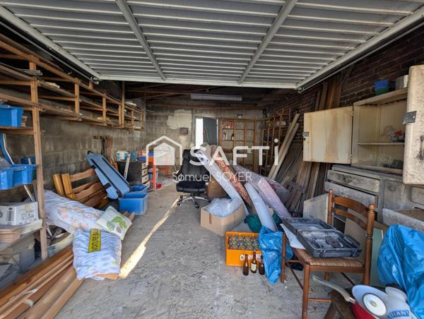 GRANDE MAISON INDIVIDUELLE, DEUX GARAGES, JARDIN