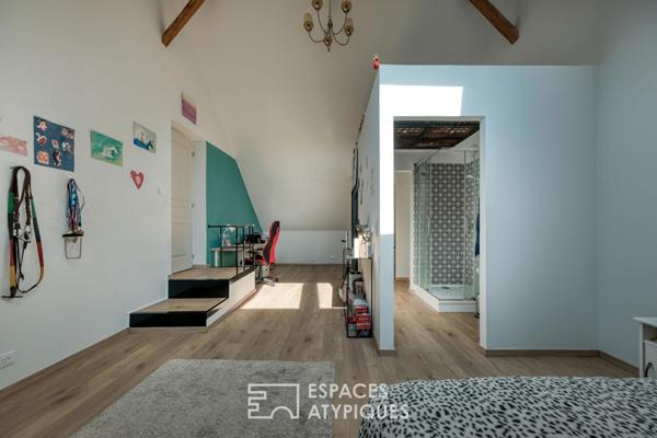 Maison familiale de caractère aux volumes généreux