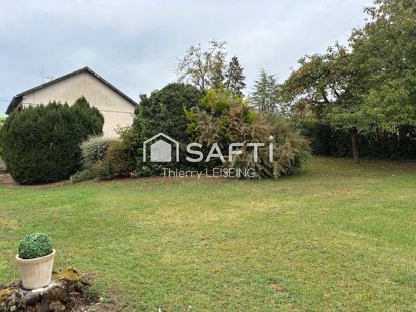 Maison traditionnelle avec 3 chambres et appartement indépendant au RDC sur terrain de 1200 m2