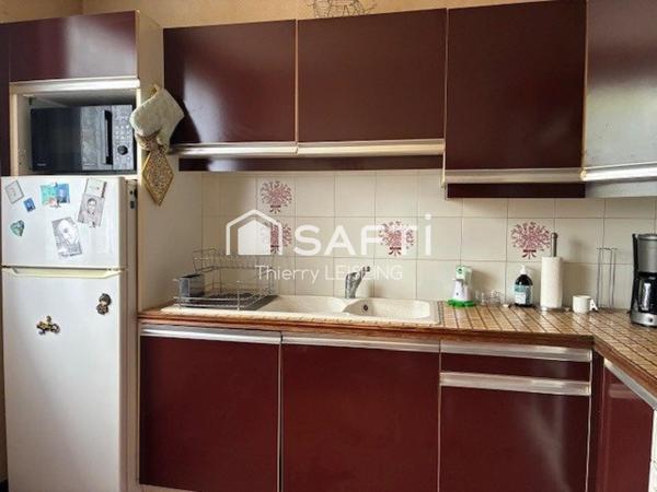 Maison traditionnelle avec 3 chambres et appartement indépendant au RDC sur terrain de 1200 m2