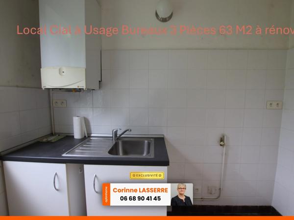 GIEN partie d'immeuble de 3 lots principaux avec garages et caves