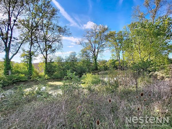 À vendre Propriété avec Maison en pierre de 280 m² avec et parc de 7 hectares avec lac à Mézin