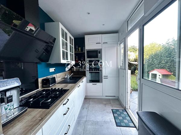 Maison 6 pièce(s) 3 chambre(s) 100 m²