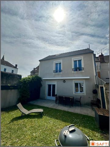 Maison de ville avec 3 chambres et jardin privé.