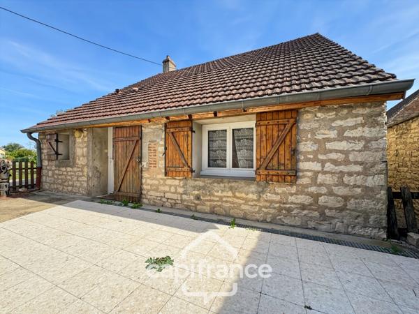 Maison en pierre de 1865 – 3 chambres, garage et jardin : une belle opportunité à Bey