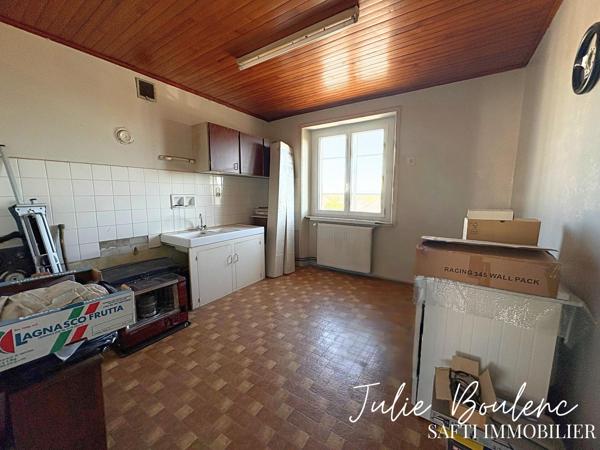 Maison composée de 2 appartements avec garage et comble