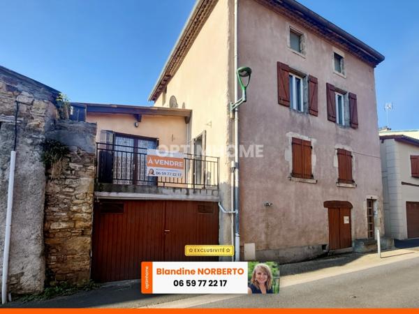 Maison de village + terrasse + garage et dépendances à Vertaizon