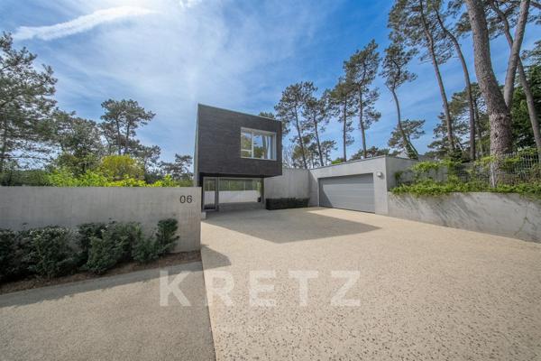 Villa d'architecte ultra-sécurisée au coeur du Bois de Vincin