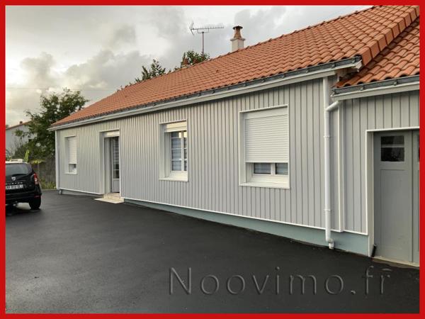 Maison de plain-pied avec jardin et véranda à 2 pas du centre-ville