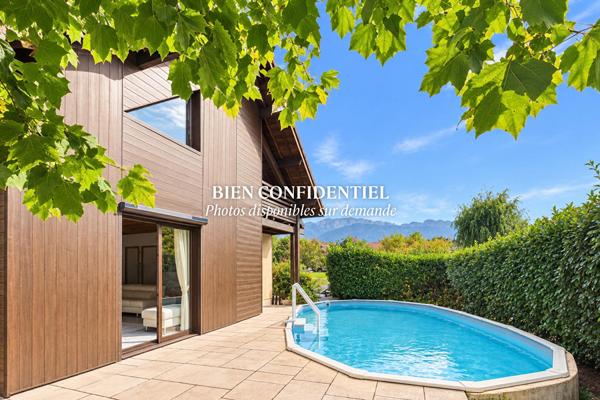 Maison ossature bois avec piscine et vue montagnes