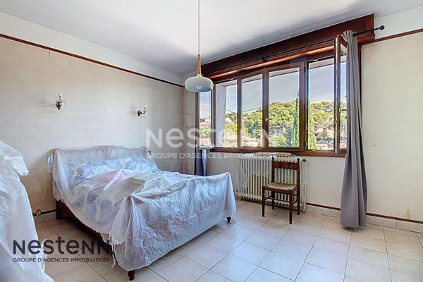 Maison de type 4 d'environ 90m² avec grand sous-sol, garage, terrasse et jardin