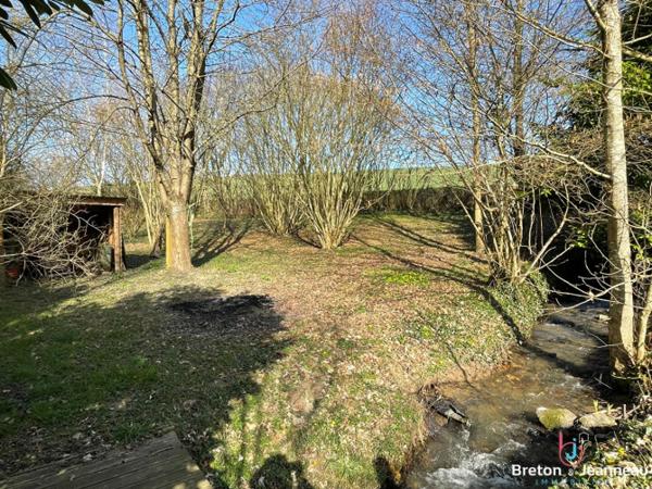 Terrain de loisir avec un étang à St Germain de Coulamer 53