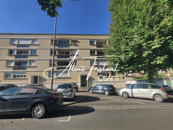 Appartement 74m2 - 2 chambres - Balcon - Garage