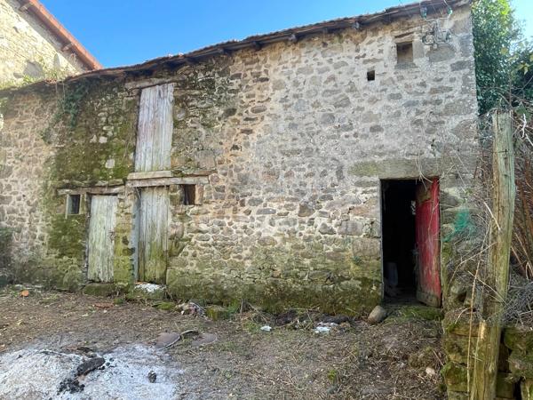 Maison à rénover avec grange et jardin à Châteauponsac