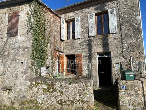Maison à rénover avec grange et jardin à Châteauponsac