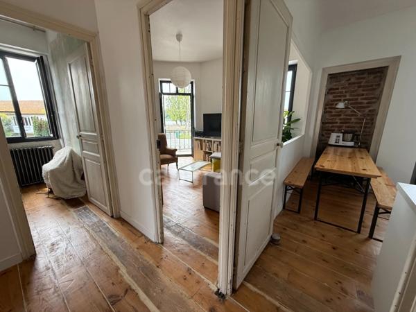 Maison de ville avec rapport locatif dans copropriété