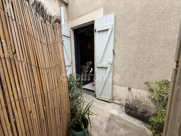 Maison de ville avec rapport locatif dans copropriété