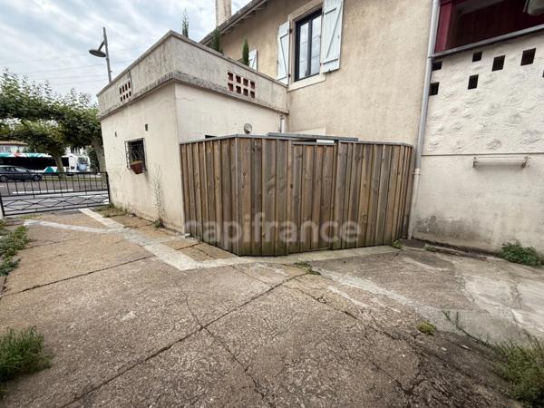 Maison de ville avec rapport locatif dans copropriété