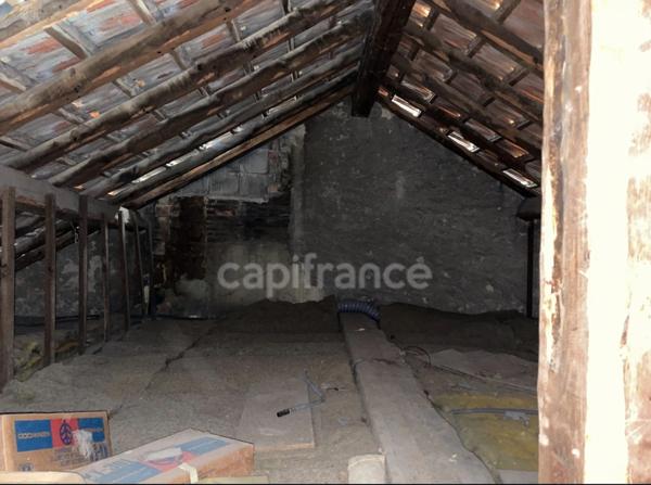 Maison de ville avec rapport locatif dans copropriété