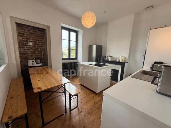 Maison de ville avec rapport locatif dans copropriété