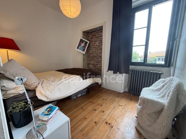 Maison de ville avec rapport locatif dans copropriété