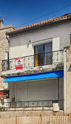 Maison avec local commercial