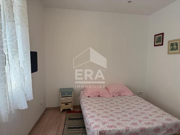 Maison avec local commercial