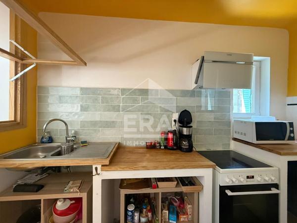 Maison avec local commercial