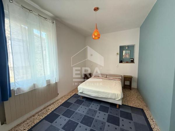 Maison avec local commercial