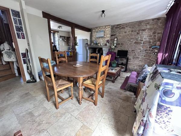 Maison mitoyenne 1 côté Le Mené 70 m²