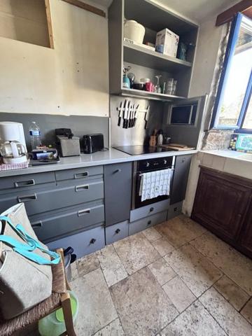 Maison mitoyenne 1 côté Le Mené 70 m²