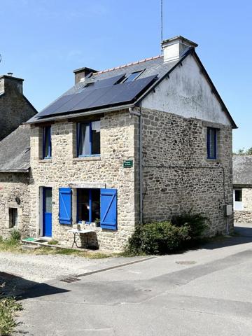 Maison mitoyenne 1 côté Le Mené 70 m²