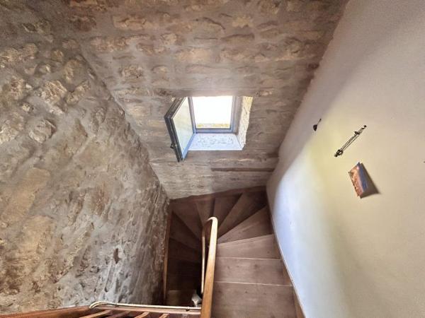 Maison mitoyenne 1 côté Le Mené 70 m²
