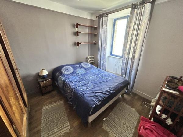 Maison mitoyenne 1 côté Le Mené 70 m²