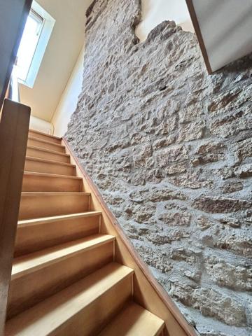 Maison mitoyenne 1 côté Le Mené 70 m²