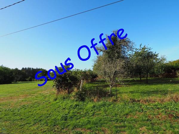 Rare : parcelle construcible dans bel environnement calme et verdoyant