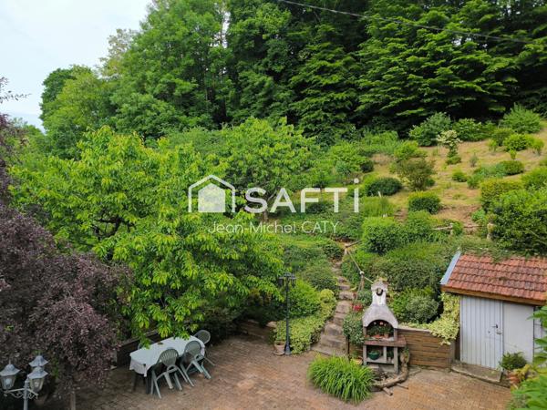 Fraisans maison de 144 m² sur 3594 m² de terrain avec 4 chambres.