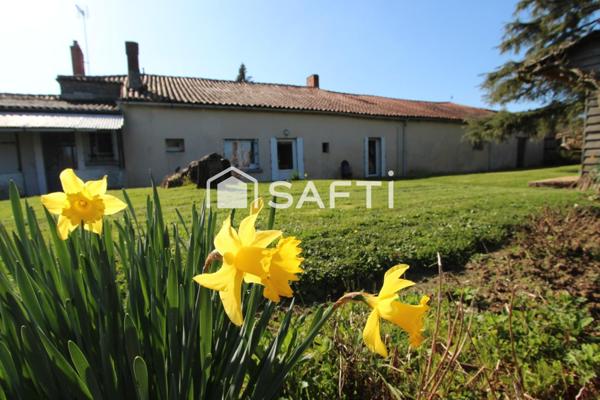 MAISON EN PIERRE AVEC NOMBREUSES DÉPENDANCES