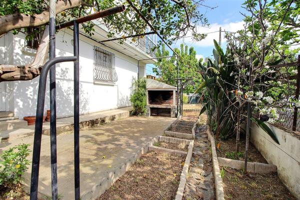 A VENDRE MAISON DE VILLE F4/5 SUR TERRAIN 3 FACES AU COEUR DU VILLAGE