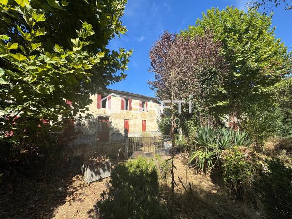 Propriété en pierre, à rénover + revenu locatif