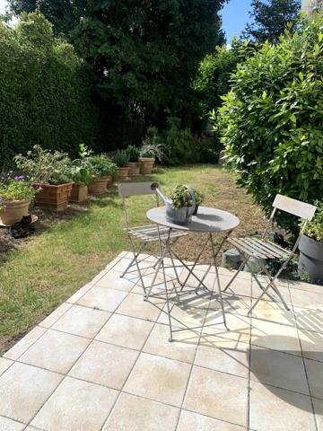Bel appartement avec jardin et garage privatifs