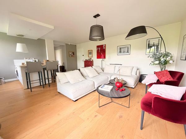 Bel appartement avec jardin et garage privatifs