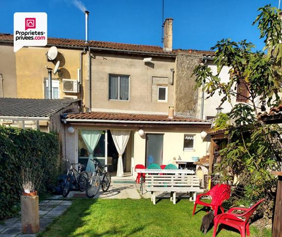 Immeuble en pierre de 156 m² avec local commercial + maison avec jardin