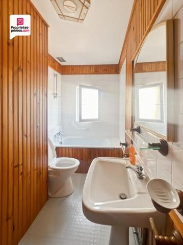 Immeuble en pierre de 156 m² avec local commercial + maison avec jardin