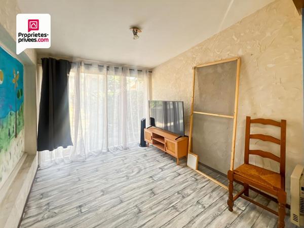 Immeuble en pierre de 156 m² avec local commercial + maison avec jardin